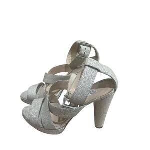 oscar de la renta stapped patent leather heels